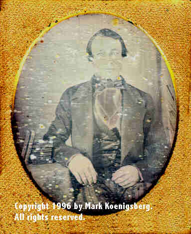 Sixth-plate daguerreotype of a Man with Seven Daguerreotype Cases on Table
