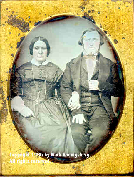 Quarter-plate daguerreotype of a Couple with a Daguerreotype Pendant