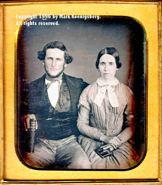 Quarter-plate (oversized) daguerreotype of a Couple with a Daguerreotype